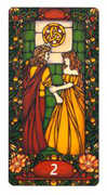Two of Coins Tarot card in Art Nouveau deck