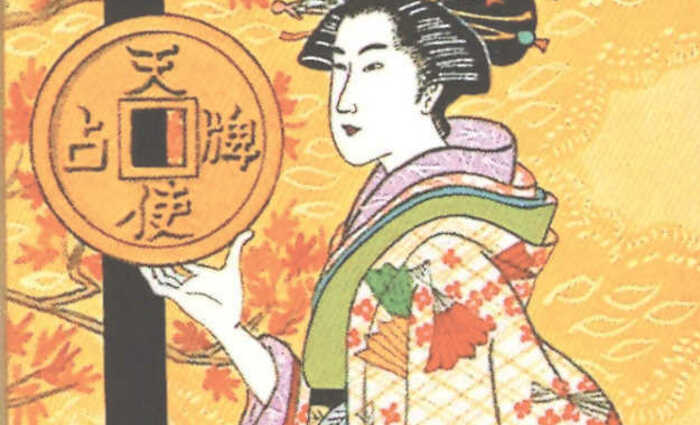 woman holding chinese coin