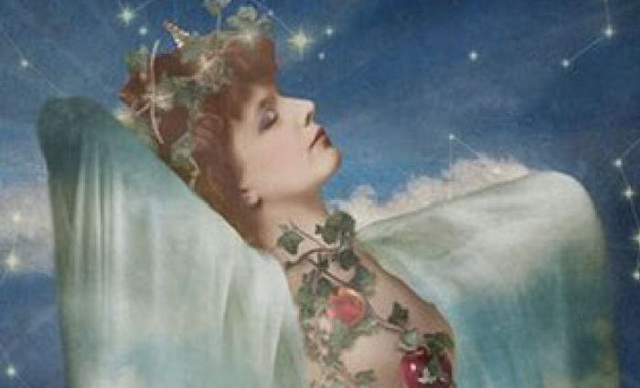 A woman with a floral crown closes her eyes in the moonlight. (from Dreamkeepers Tarot)