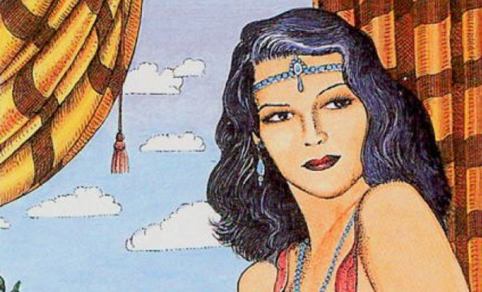 A woman with a beaded crown sits with a blue sky behind her. (from The Cosmic Tarot)